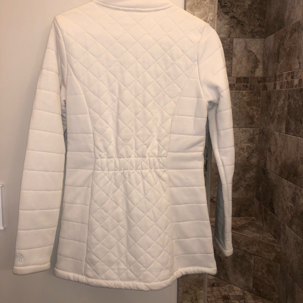 The North Face mid length winter white jacket.